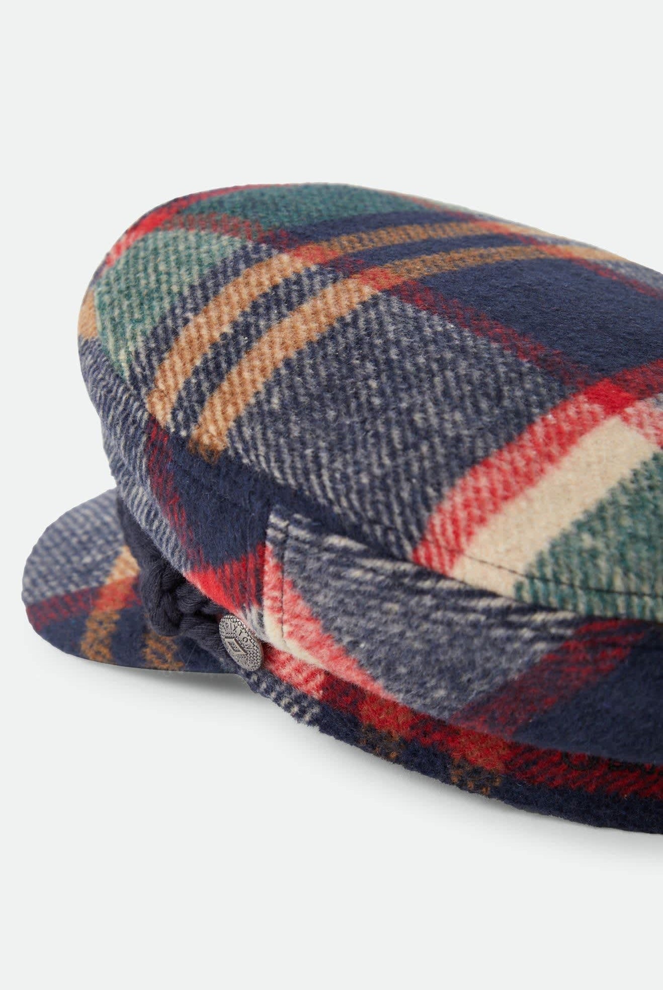 Unisex Fiddler Fisherman Cap in the color Navy/Green/Red/Cream - Additional Laydown image