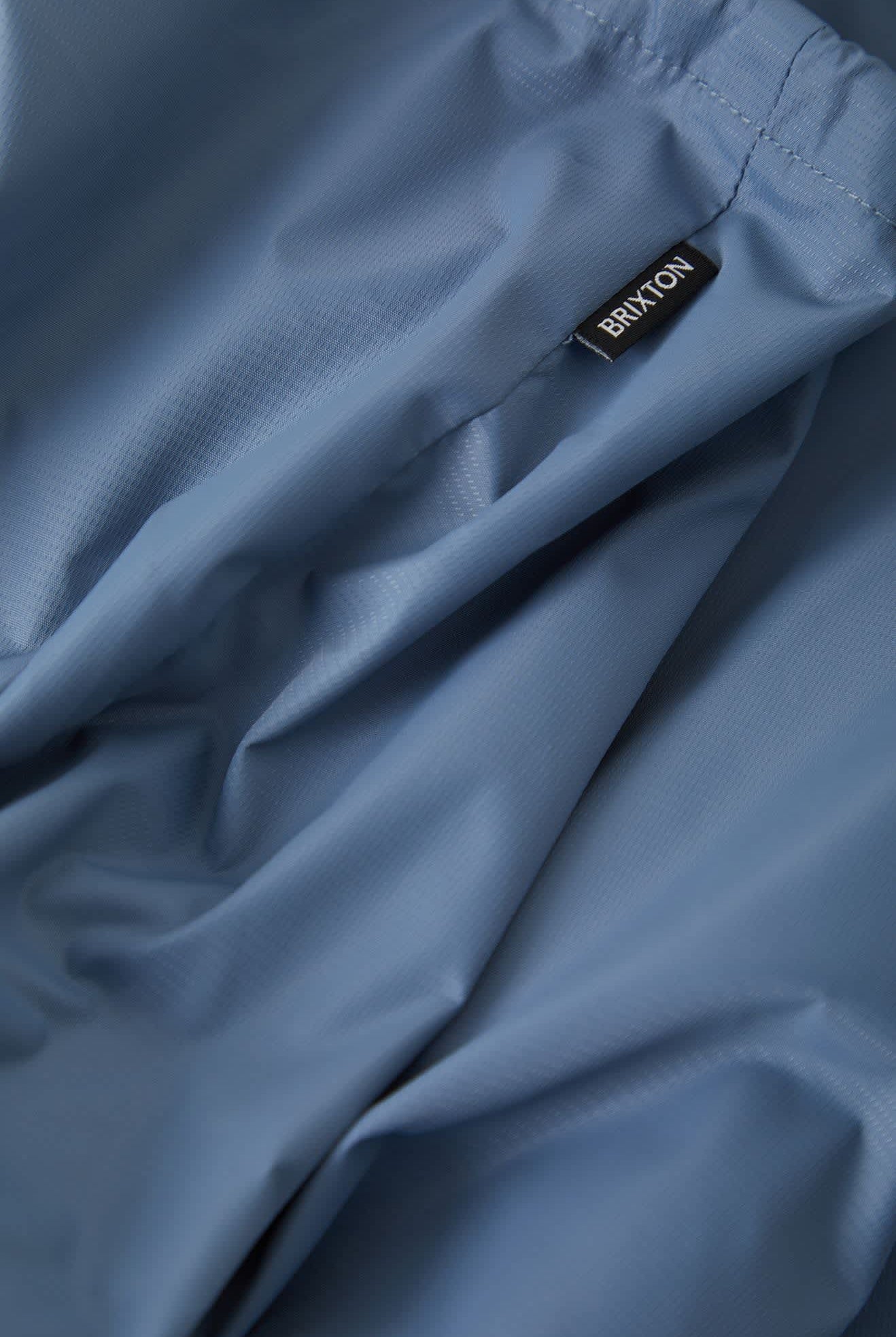 Men's Hooded Claxton Lightweight Jacket in the color Slate Blue - Additional Laydown image