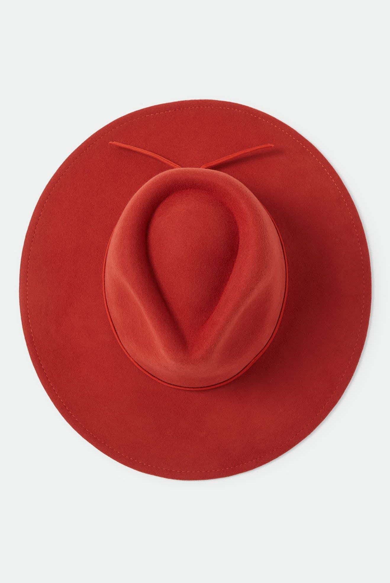 Women's Juniper Packable Hat in the color Red Earth - Additional Laydown image