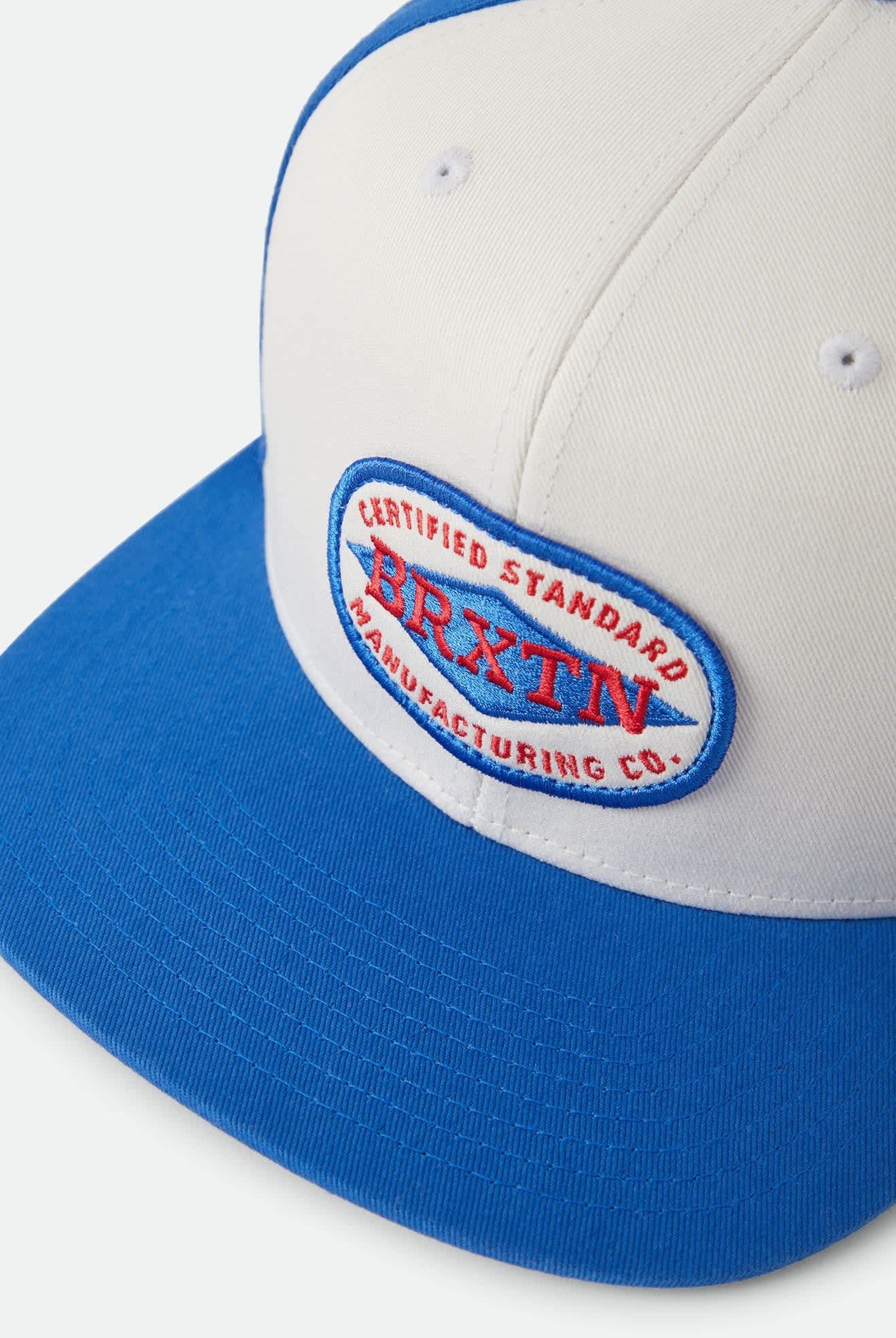 Unisex Meyers Snapback in the color Off White/Electric Indigo - Additional Laydown image