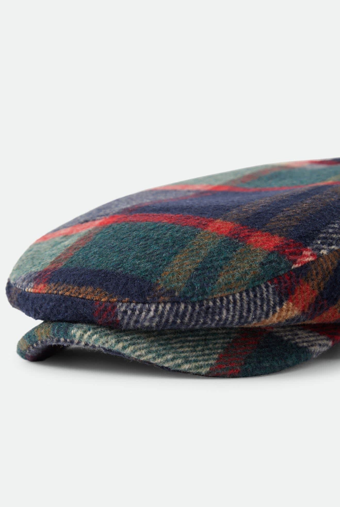 Unisex Hooligan Flat Cap in the color Navy/Green/Red/Cream - Additional Laydown image