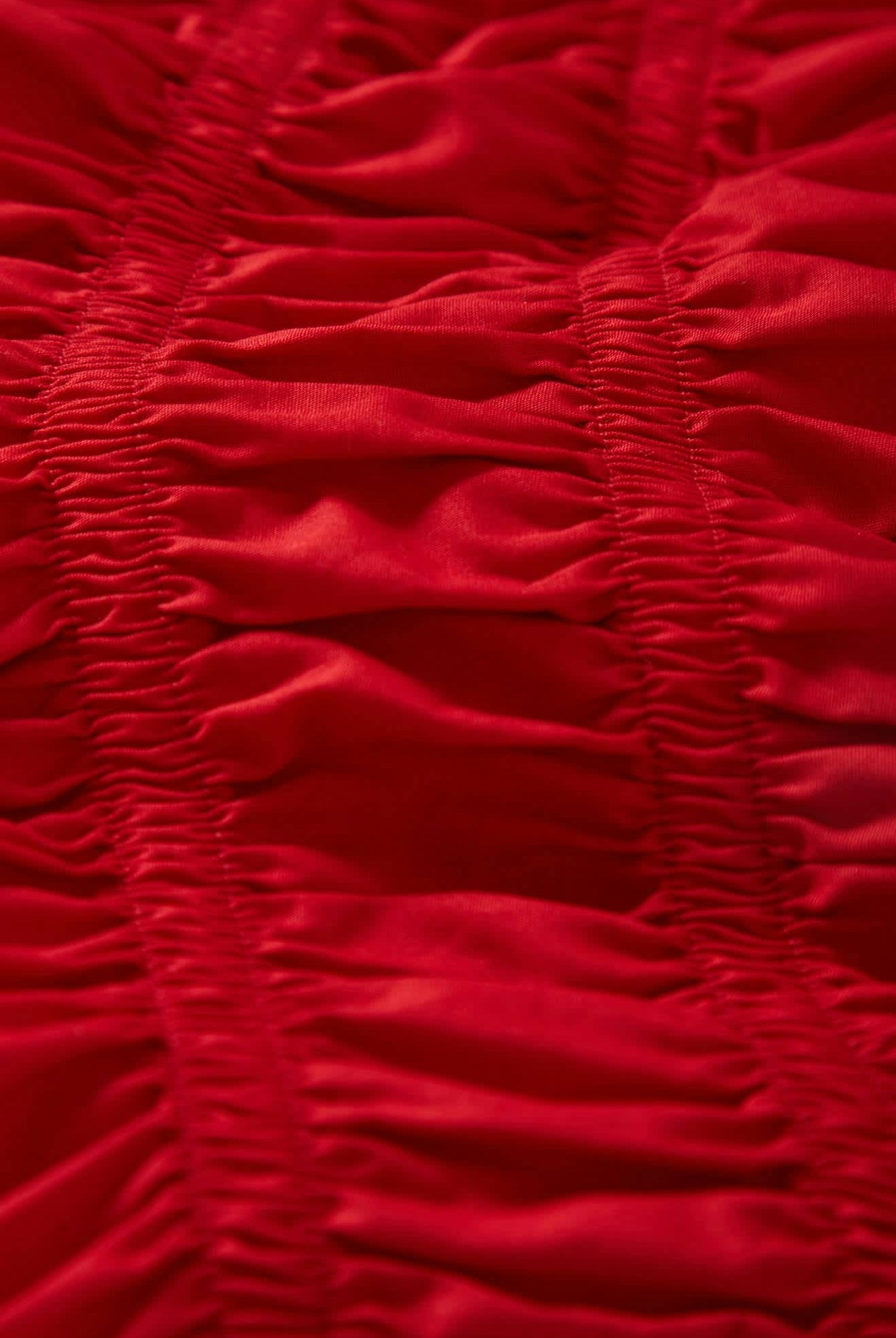 Women's Eden Smocked Top in the color Crimson - Additional Laydown image