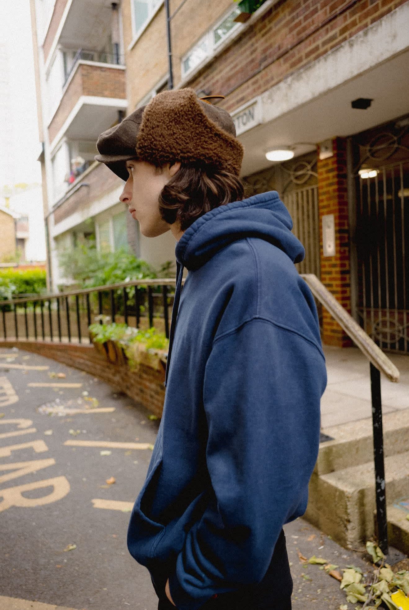 Unisex Barrel Earflap Snap Cap in the color Brown/Brown Tweed - Men's Lifestyle image