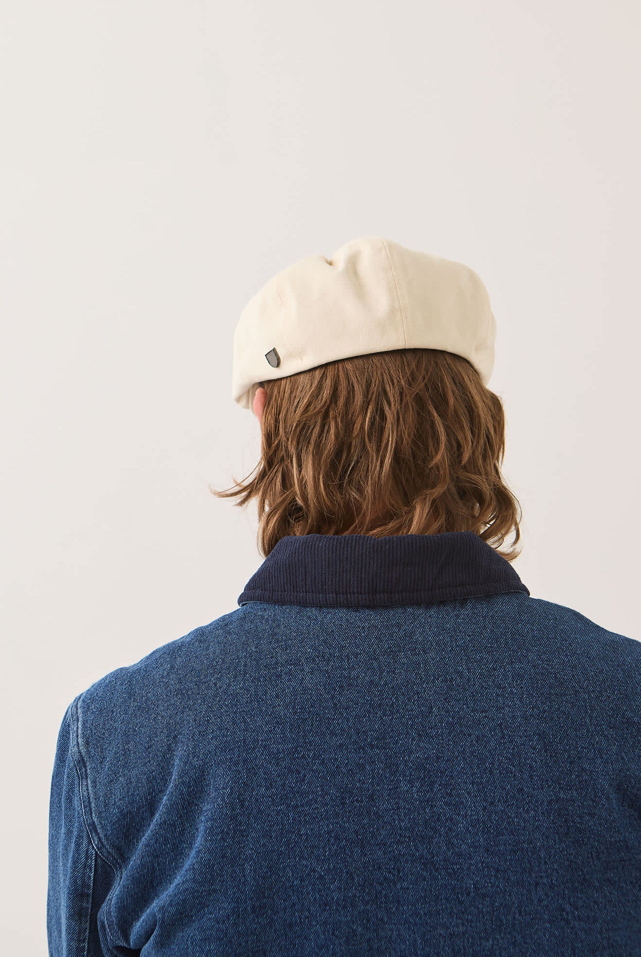 Unisex Brood Newsboy Cap in the color Egret White - Men's Back View