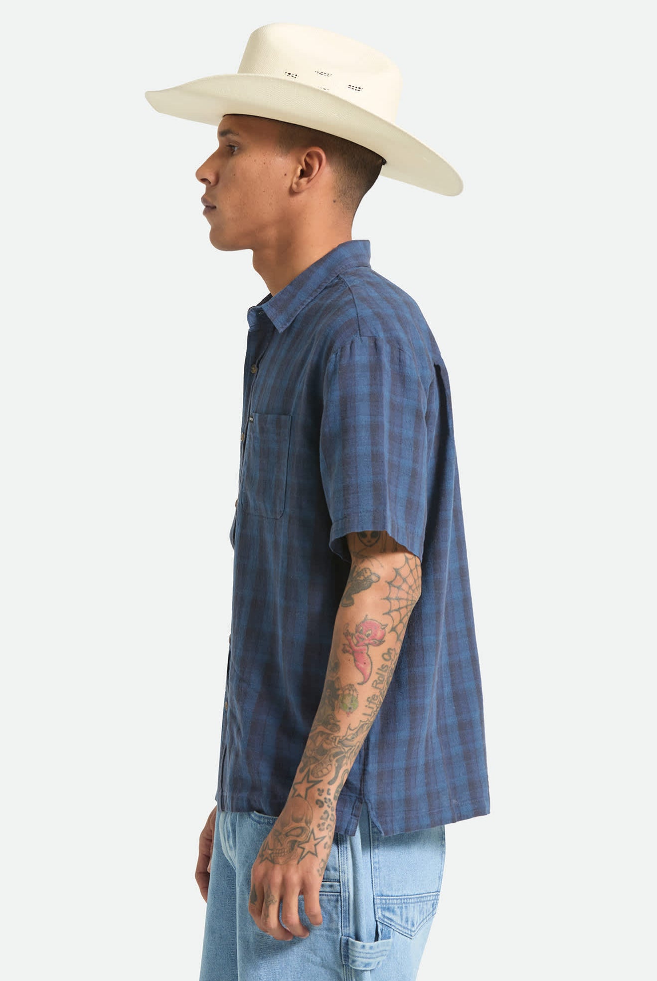 Men's Cru Linen Blend Plaid Short Sleeve Shirt in the color Dark Blue/Black Plaid - Men's Side View