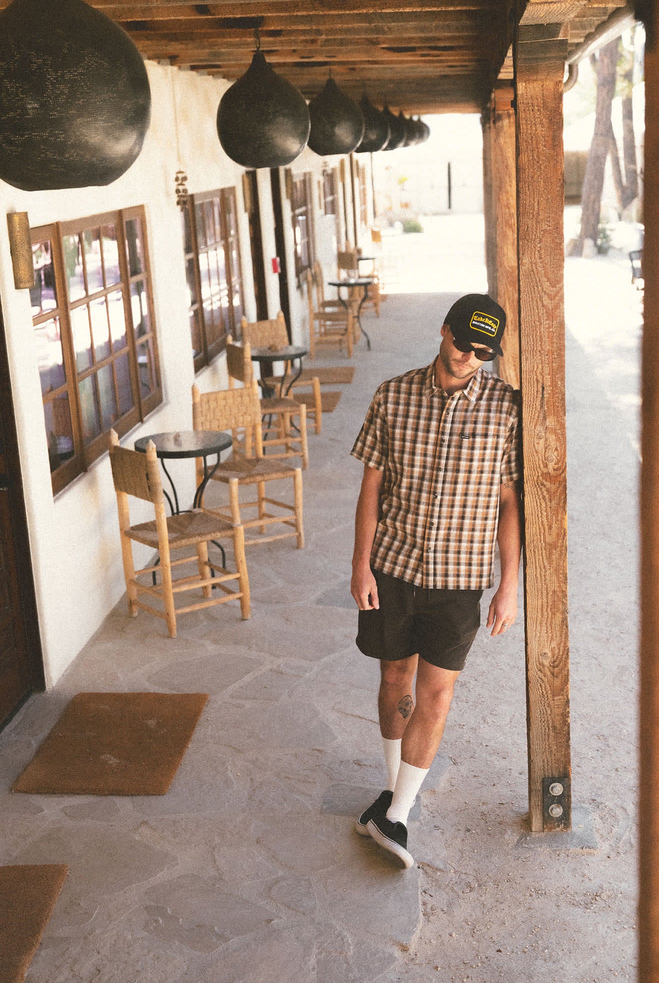 Women's Take It Easy Netplus Trucker Hat in the color Washed Black - Men's Lifestyle image