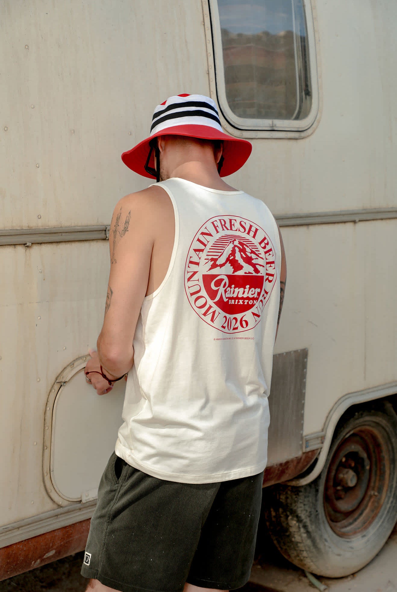 Men's Rainier Beer Run Tank in the color Natural - Men's Lifestyle image