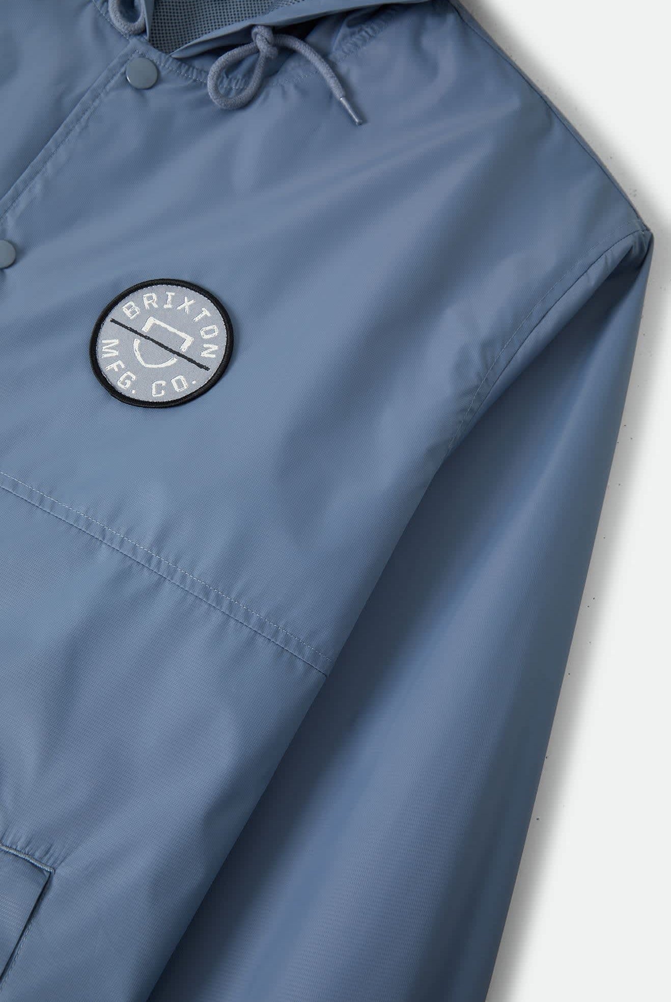 Men's Hooded Claxton Lightweight Jacket in the color Slate Blue - Additional Laydown image