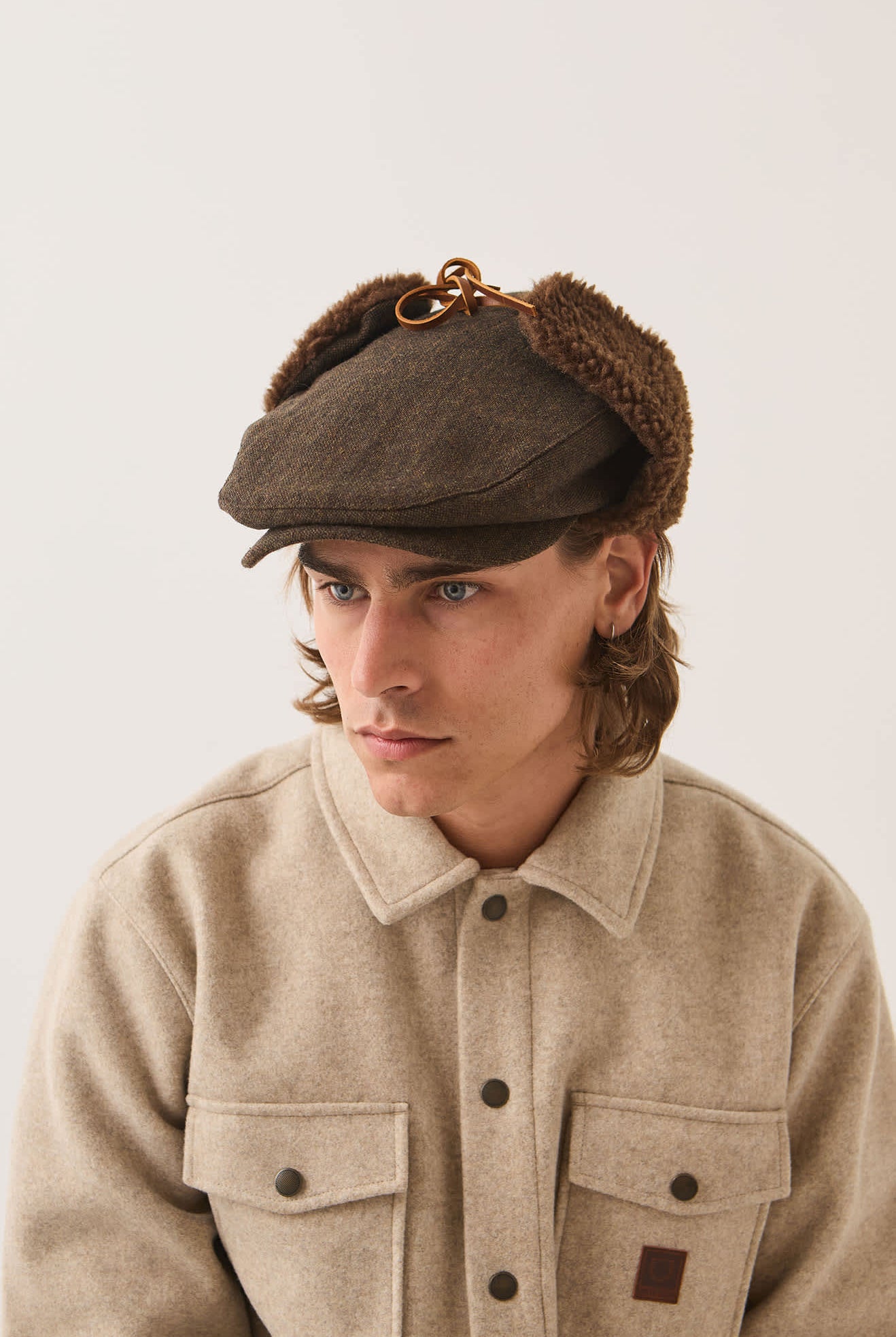Unisex Barrel Earflap Snap Cap in the color Brown/Brown Tweed - Men's Front View