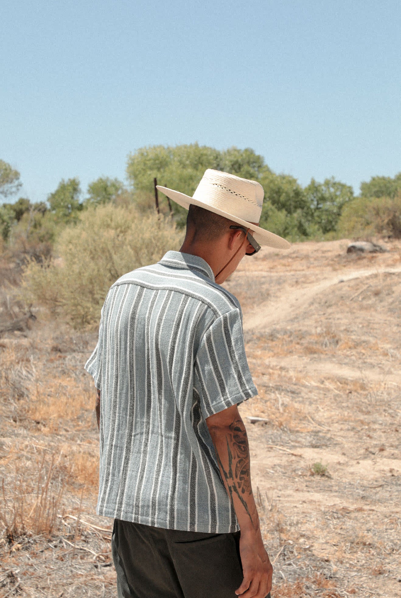 Men's The Dexter Textured Stripe Short Sleeve Shirt in the color Black/Dusty Blue - Men's Lifestyle image