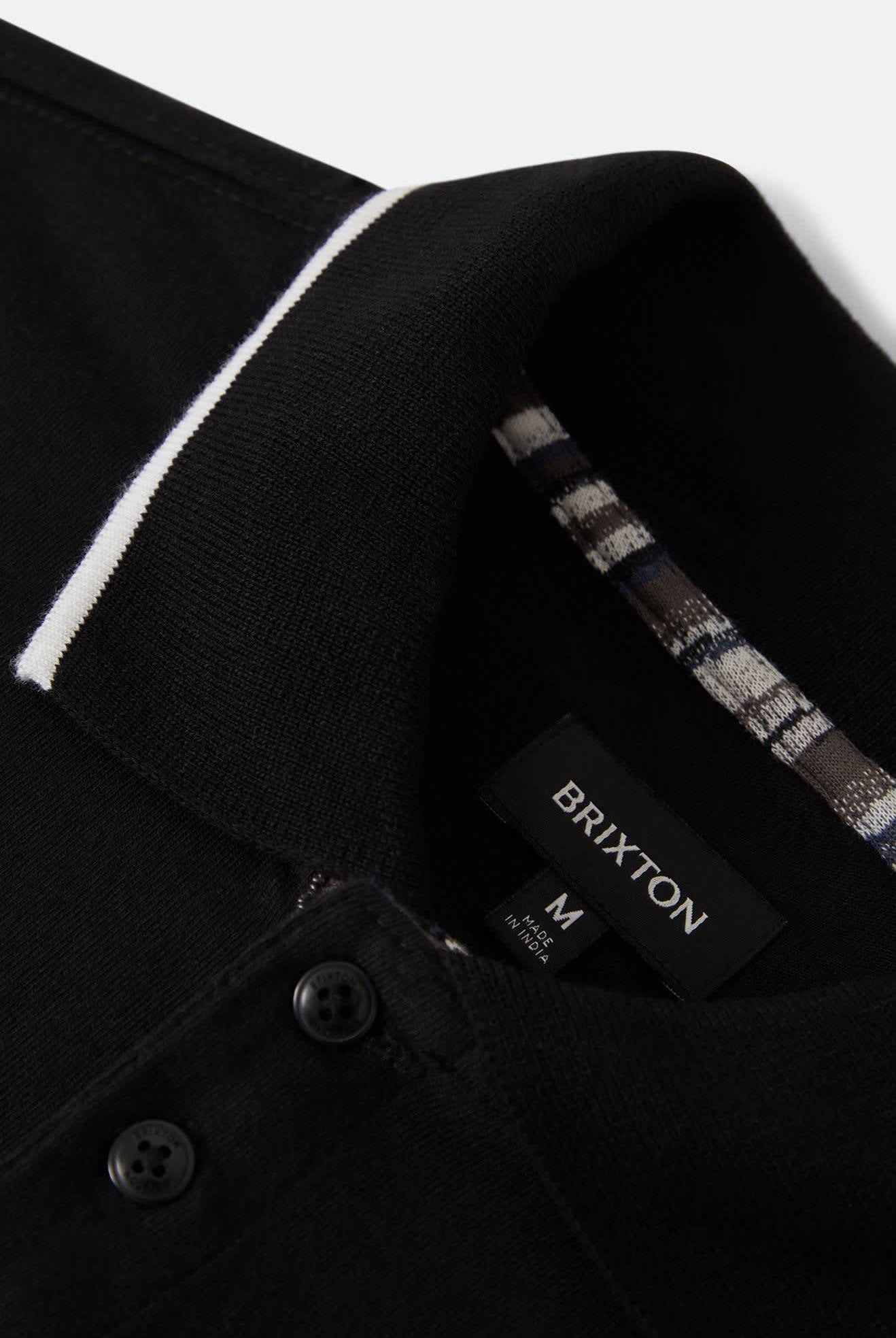 Men's Anton Short Sleeve Polo in the color Black - Additional Laydown image