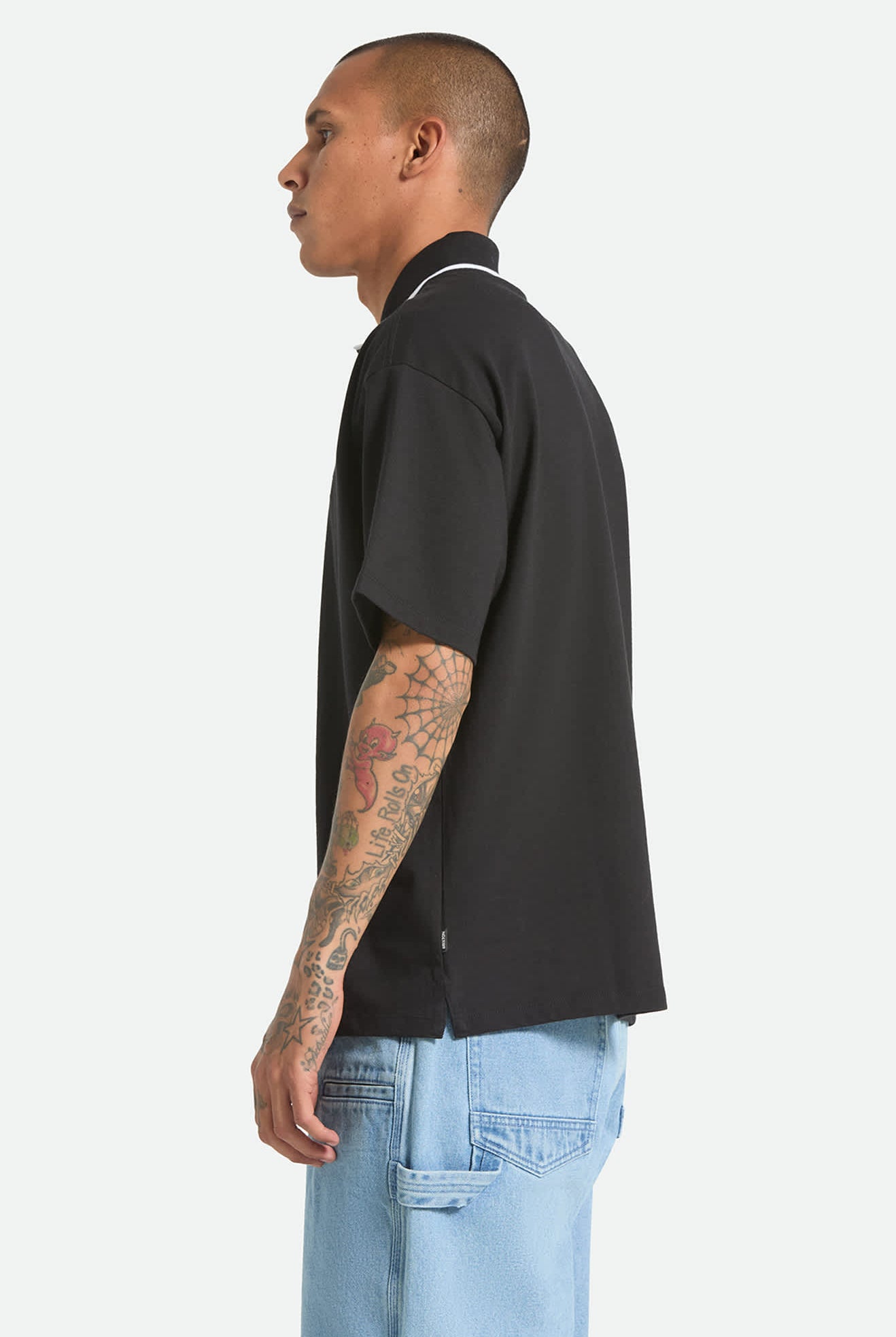 Men's Anton Short Sleeve Polo in the color Black - Men's Side View