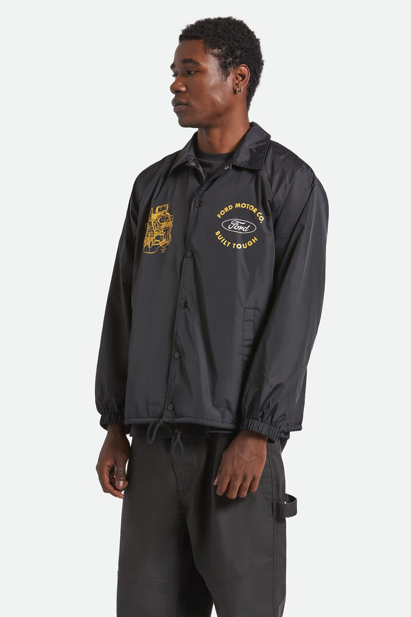 Men's Ford Built Tough Windbreaker in the color Burnt Rubber - Men's Side View