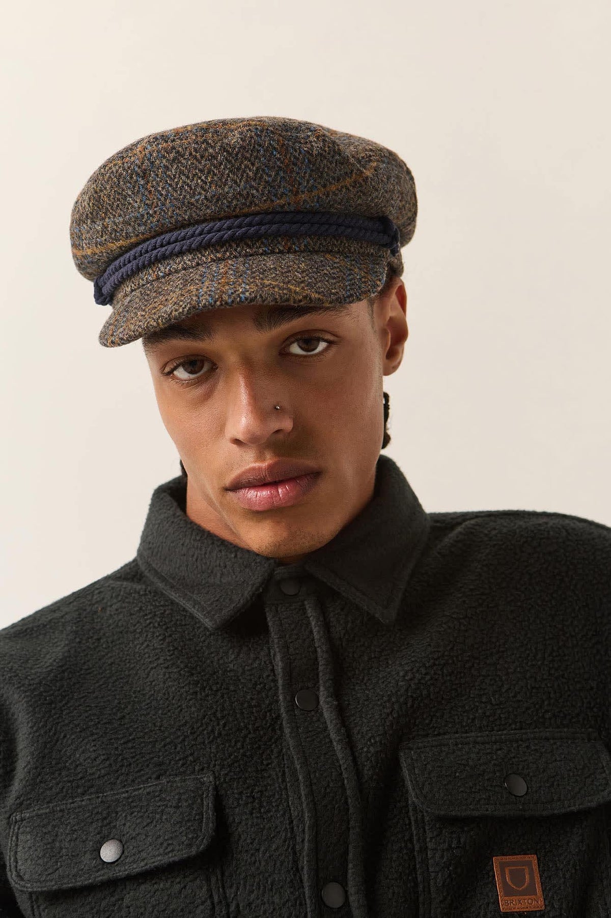 Unisex Fiddler Fisherman Cap in the color Slate Blue/Sepia/Orange - Men's Front View