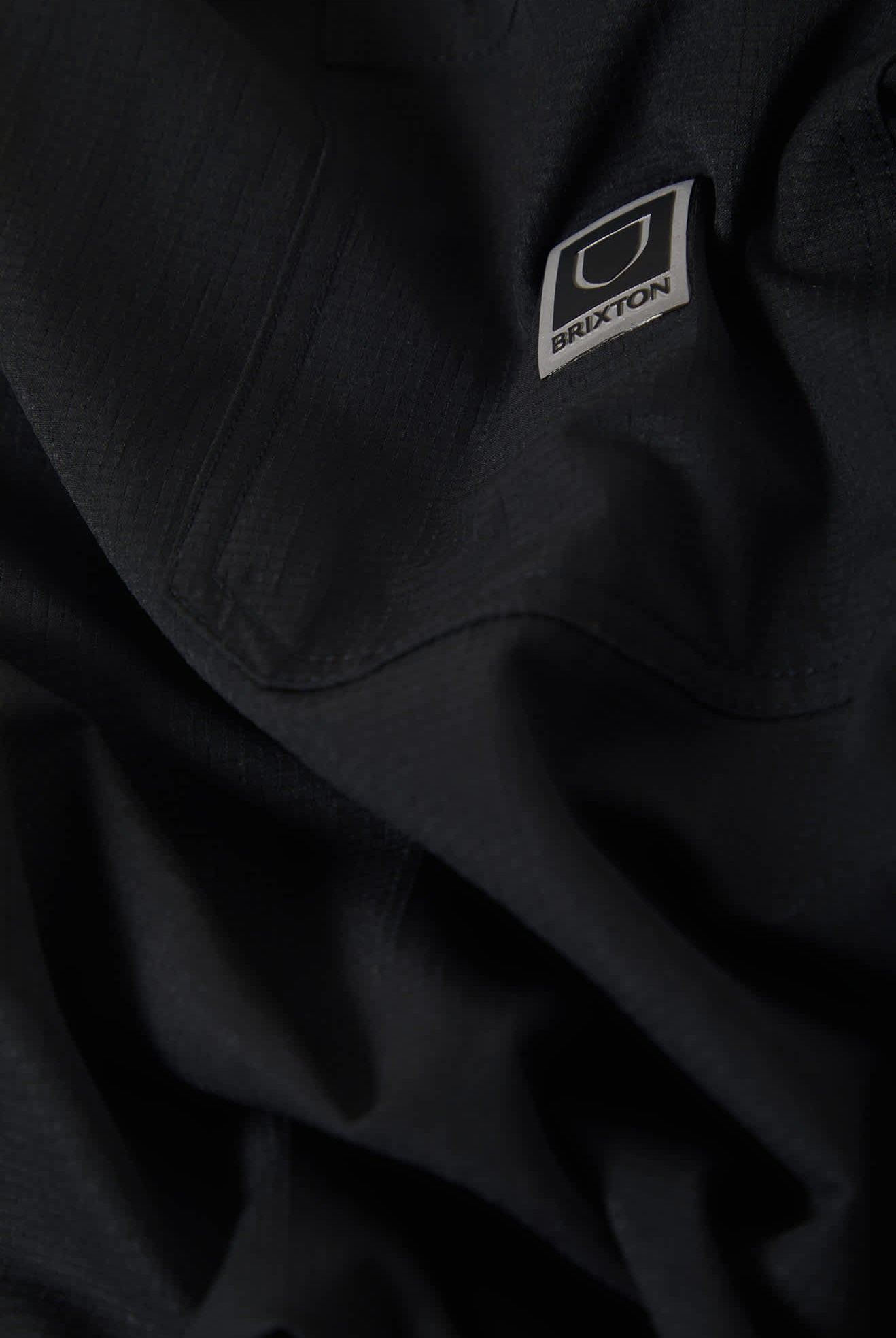 Men's Journey Lightweight 1/2 Zip Cropped Short Sleeve Shirt in the color Black - Additional Laydown image