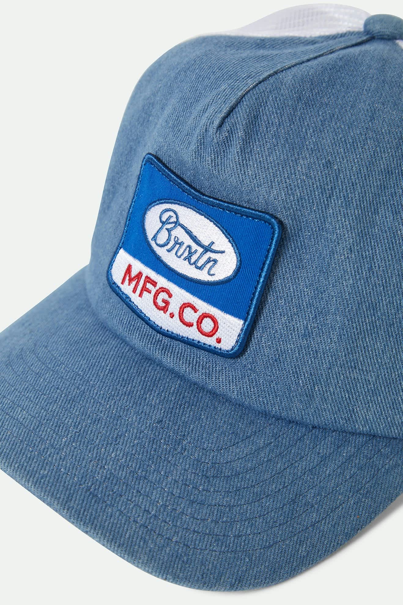 Unisex Phillips Netplus Trucker Hat in the color Denim/White - Additional Laydown image