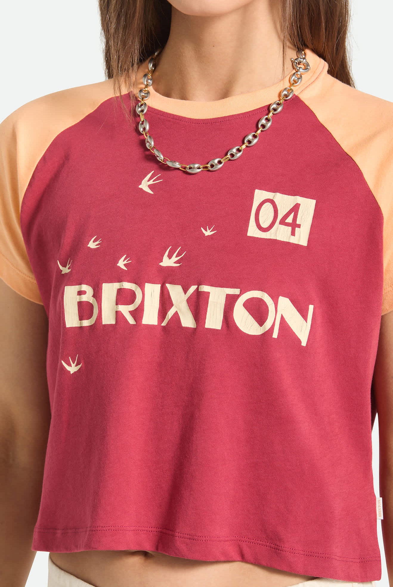 Women's Swallow Sky Cropped Raglan in the color Robust Red/Peach Cobbler - Additional Fit image