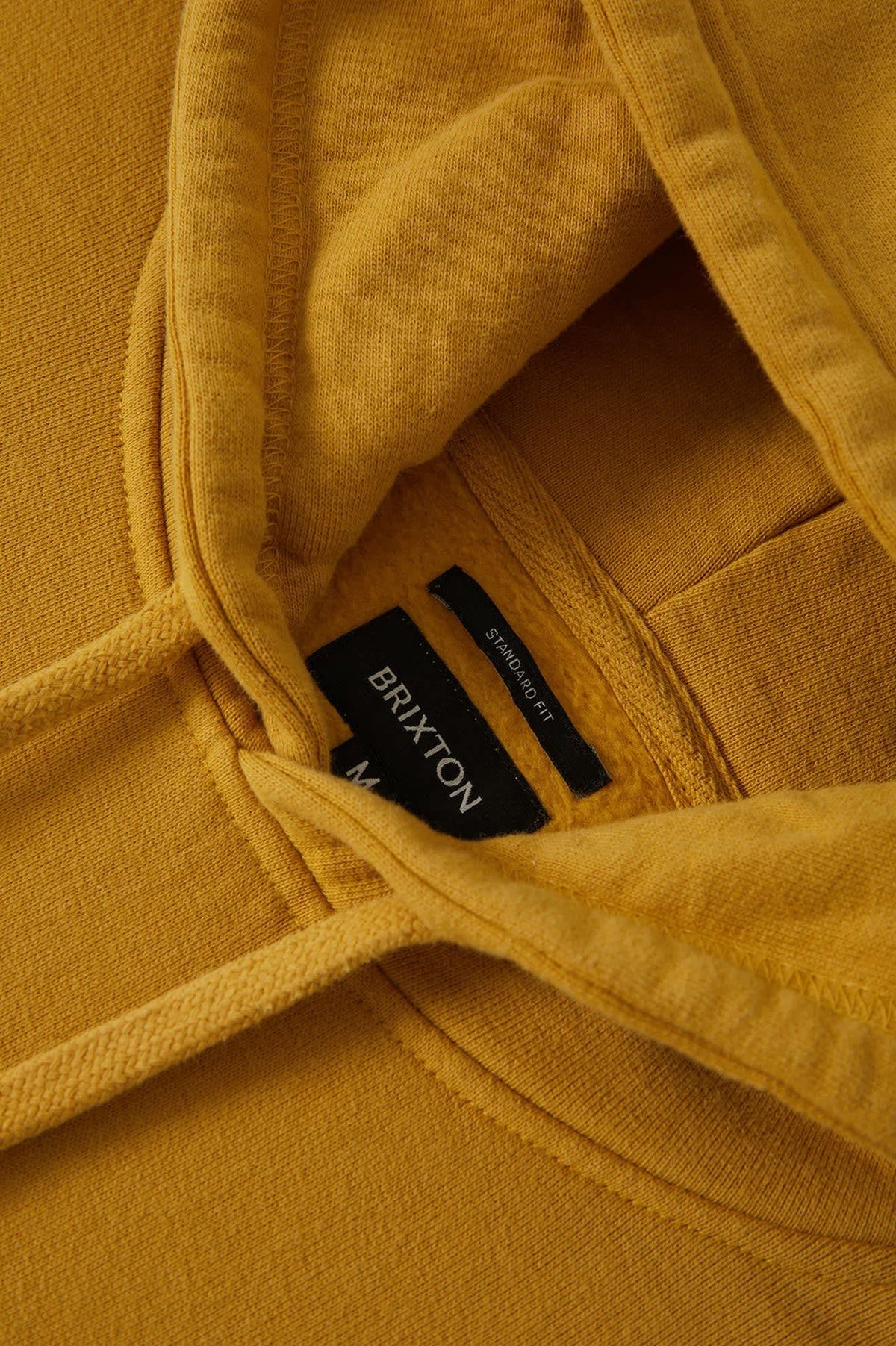 Men's Brixton Baseline Hood Fleece in the color Dusted Ochre Vintage Wash - Additional Laydown image
