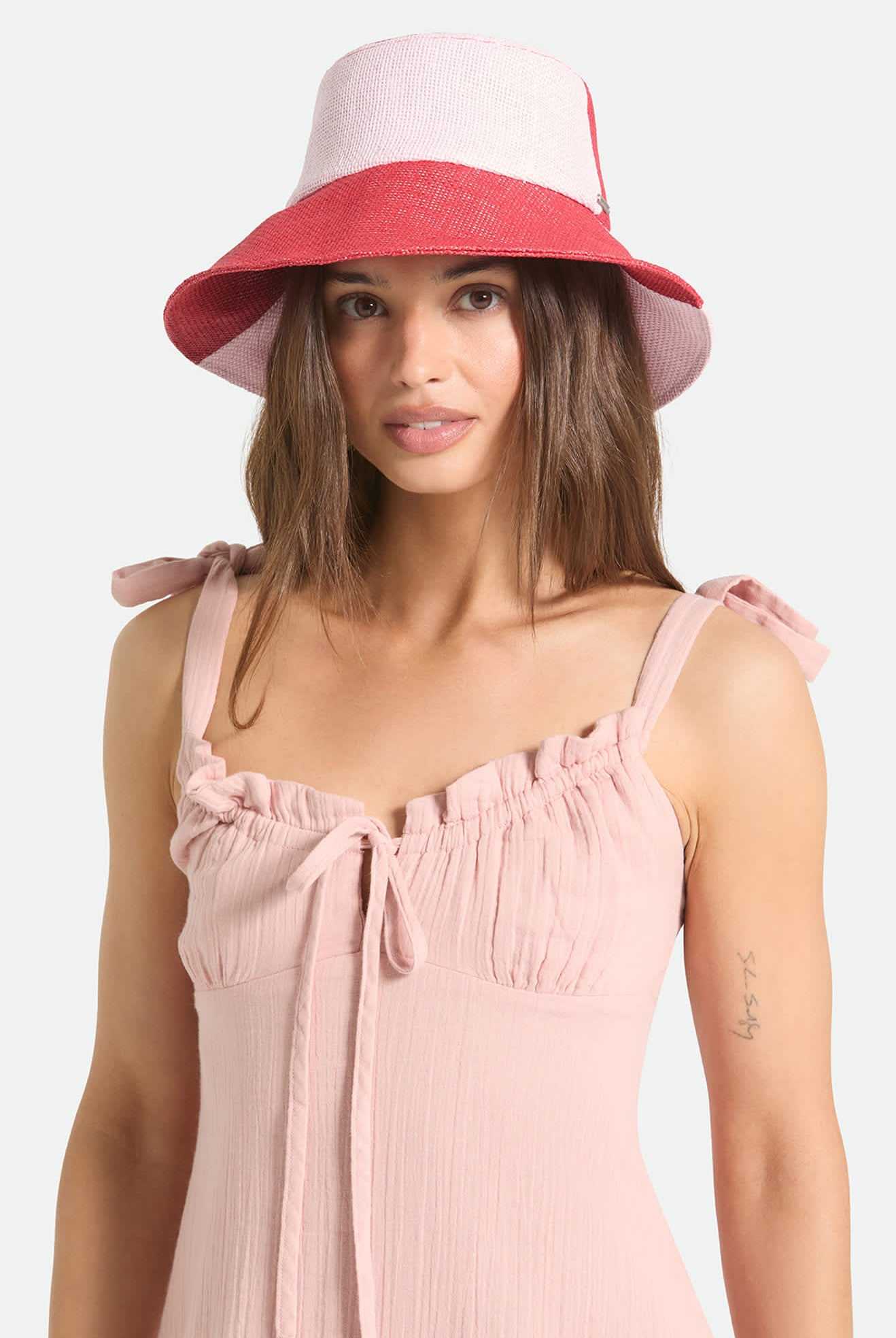 Women's Harmony Packable Bucket Hat in the color Silver Pink/Adrenaline Rush - Women's Front View