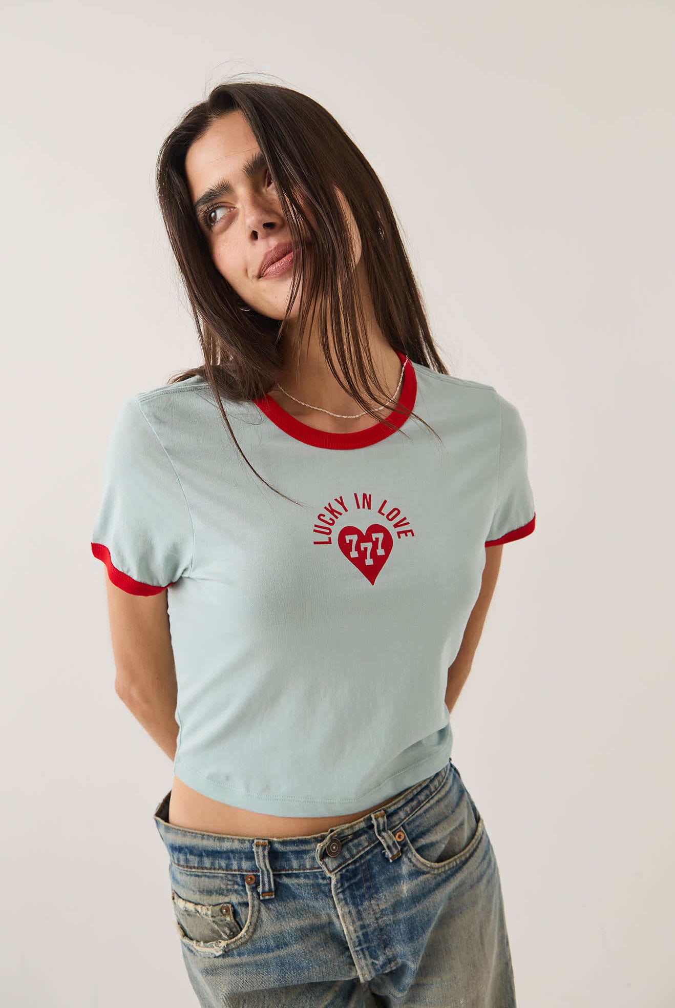 Women's Lucky In Love Baby T-Shirt in the color Sea Grass/Adrenaline Red - Additional Fit image