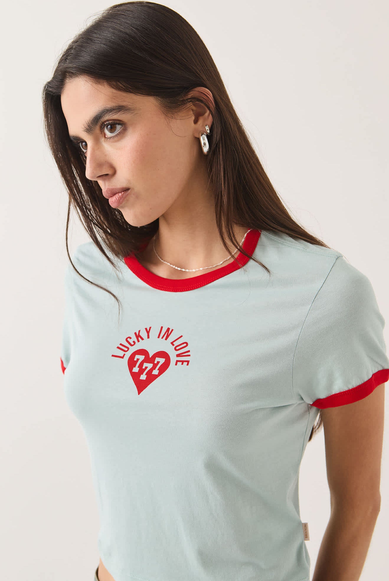 Women's Lucky In Love Baby T-Shirt in the color Sea Grass/Adrenaline Red - Additional Fit image