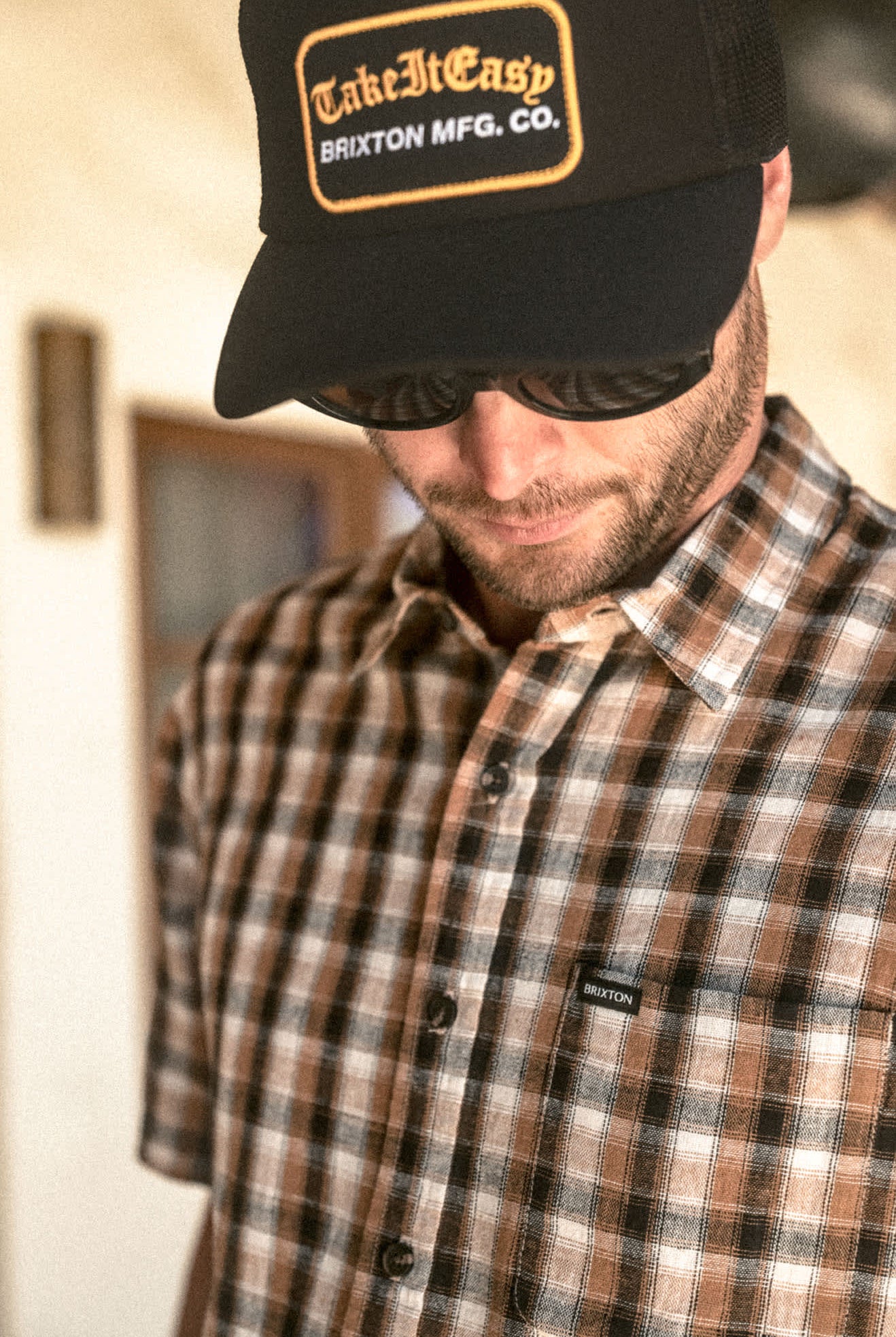 Women's Take It Easy Netplus Trucker Hat in the color Washed Black - Men's Lifestyle image