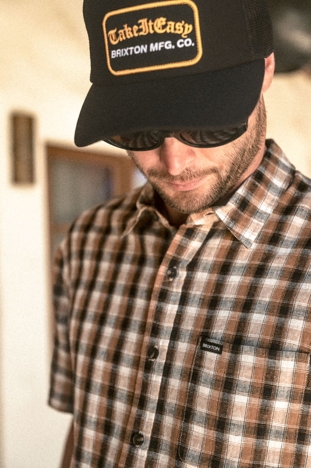 Women's Take It Easy Netplus Trucker Hat in the color Washed Black - Men's Lifestyle image