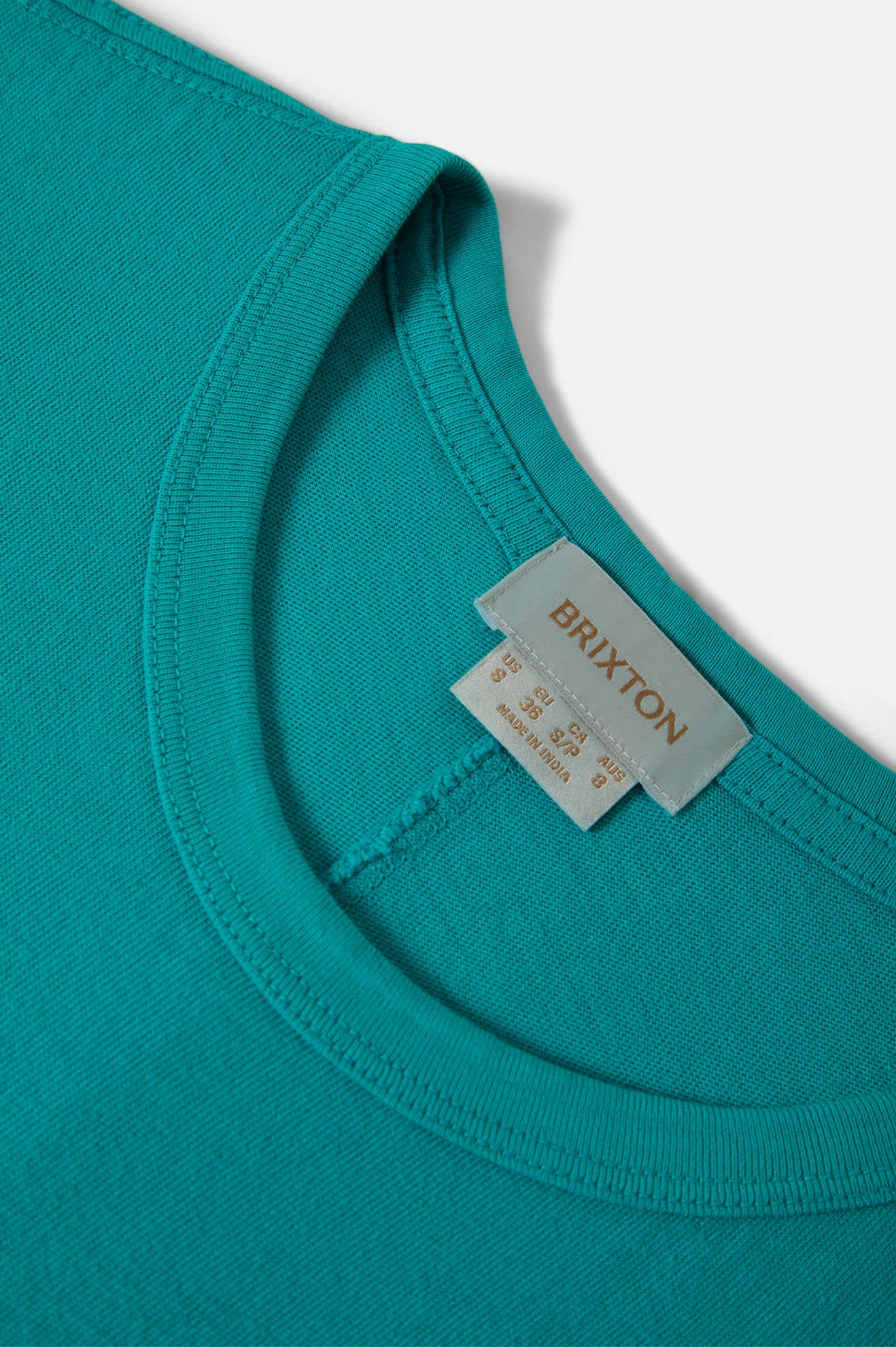 Women's Carefree Organic Garment Dye Muscle Tank in the color Retro Green - Additional Laydown image