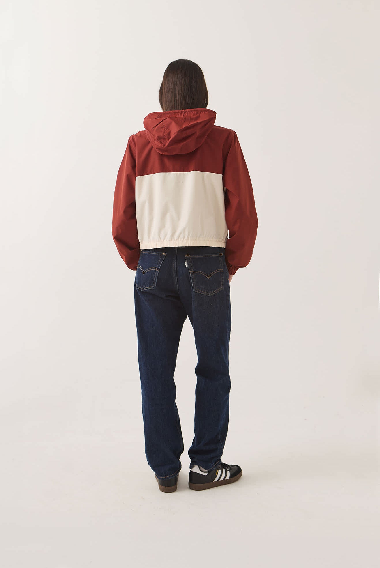 Women's Parsons Lightweight Hooded Windbreaker in the color Dark Brick/Whitecap - Women's Back View