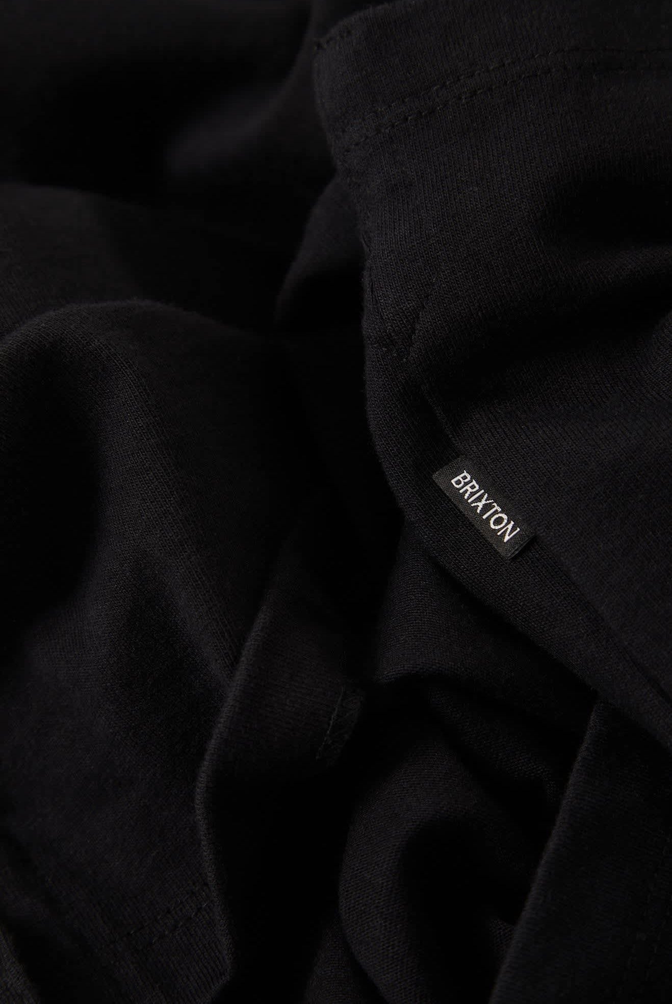 Men's Anton Short Sleeve Polo in the color Black - Additional Laydown image