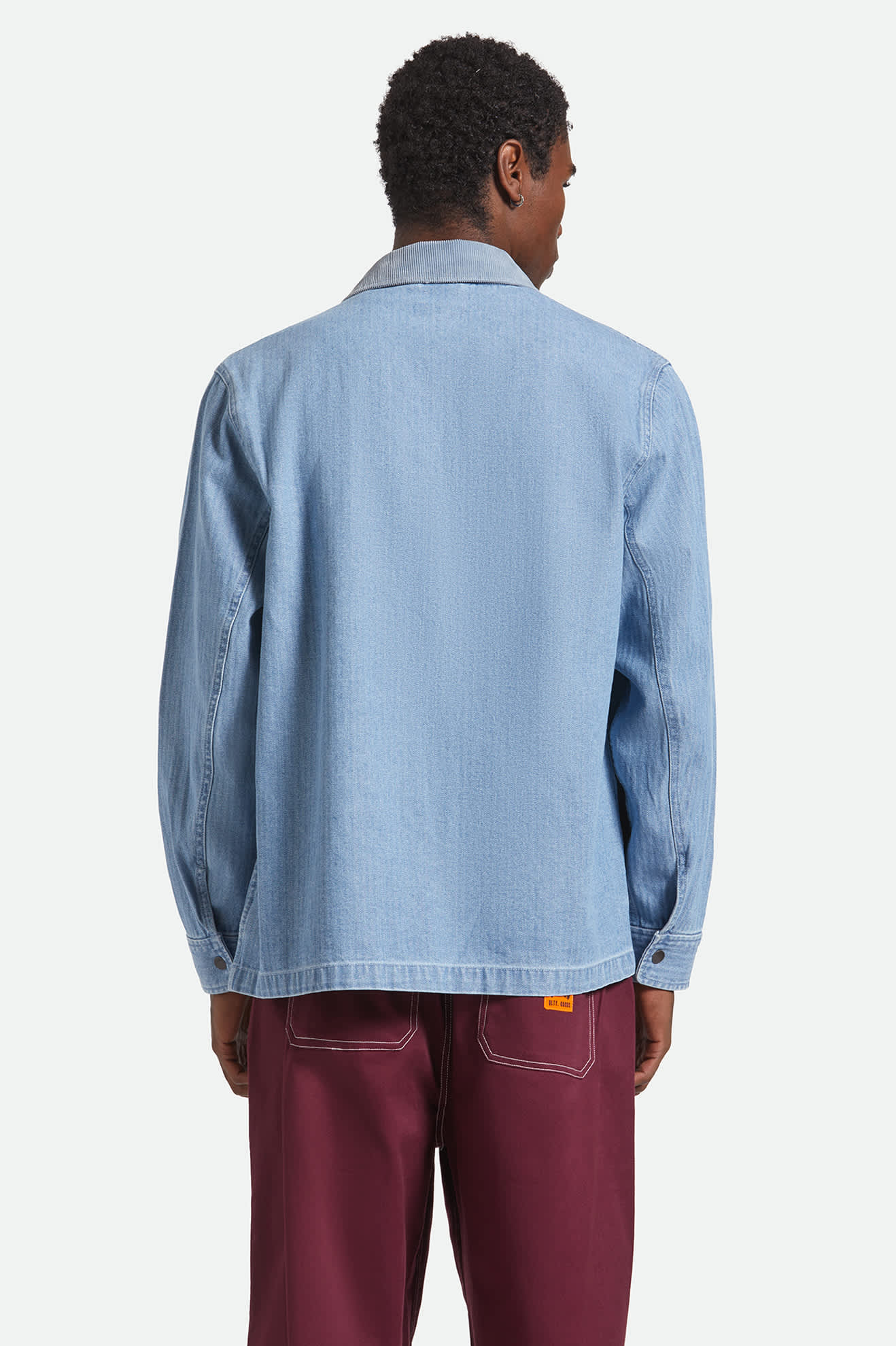Men's Herringbone Lightweight Chore Coat in the color Light Wash Denim Herringbone - Men's Back View