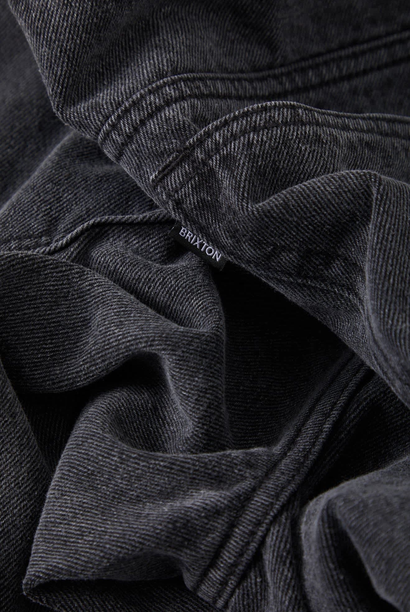 Men's Brixton Relaxed Short in the color Washed Black Denim - Additional Laydown image
