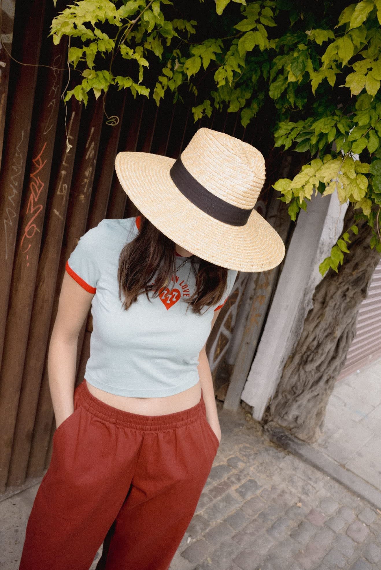 Women's Lucky In Love Baby T-Shirt in the color Sea Grass/Adrenaline Red - Women's Lifestyle image
