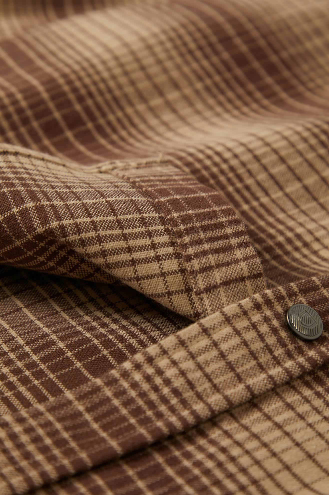 Men's Builders Bowery Stretch Water Resistant L/S Flannel in the color Pine Needle/Sunbaked - Additional Laydown image