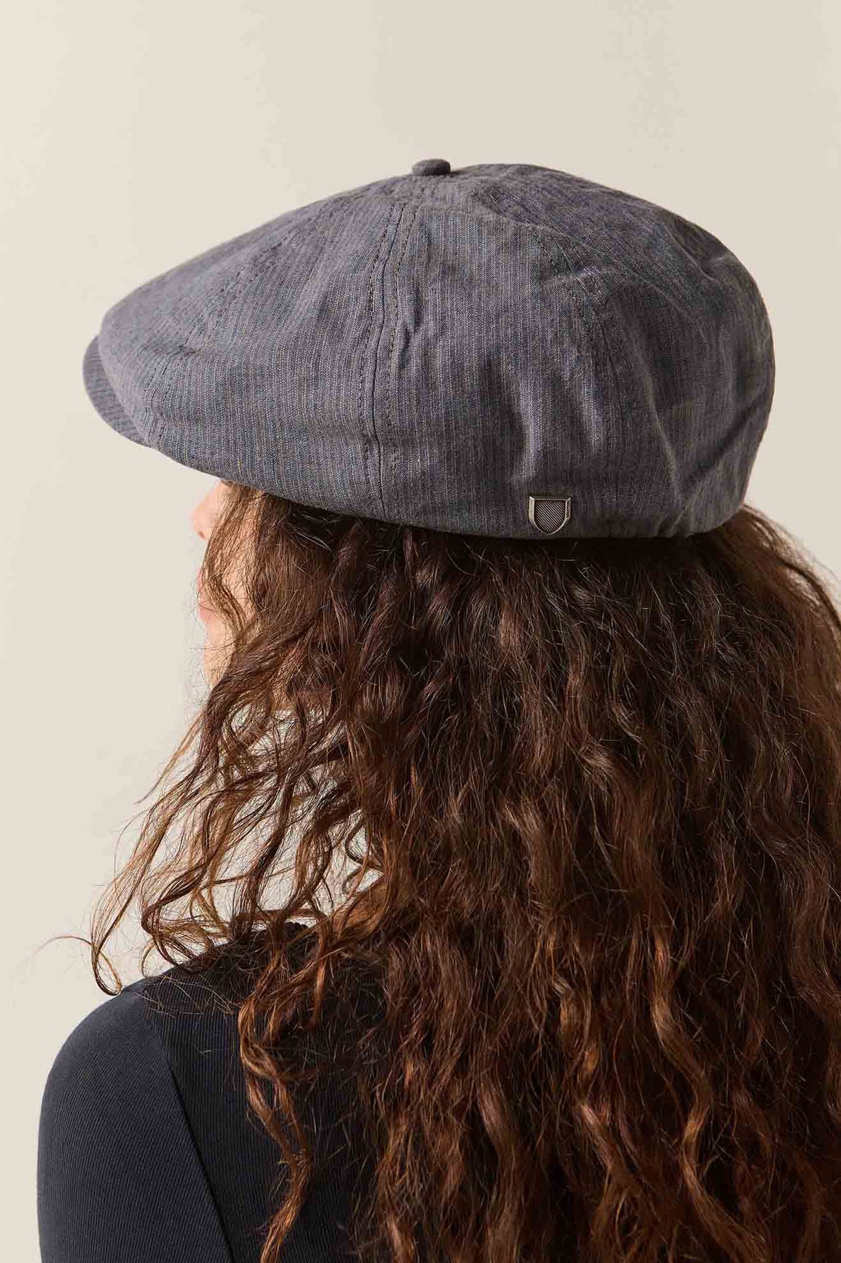 Unisex Brood Newsboy Cap in the color Indigo/Dark Sand - Women's Back View
