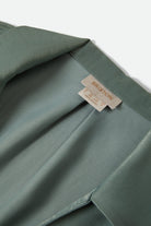 Women's Soho Silky Top in the color Blue Green Shine - Additional Laydown image