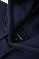 Men's Brixton Baseline Hood Fleece in the color Washed Navy Vintage Wash - Additional Laydown image