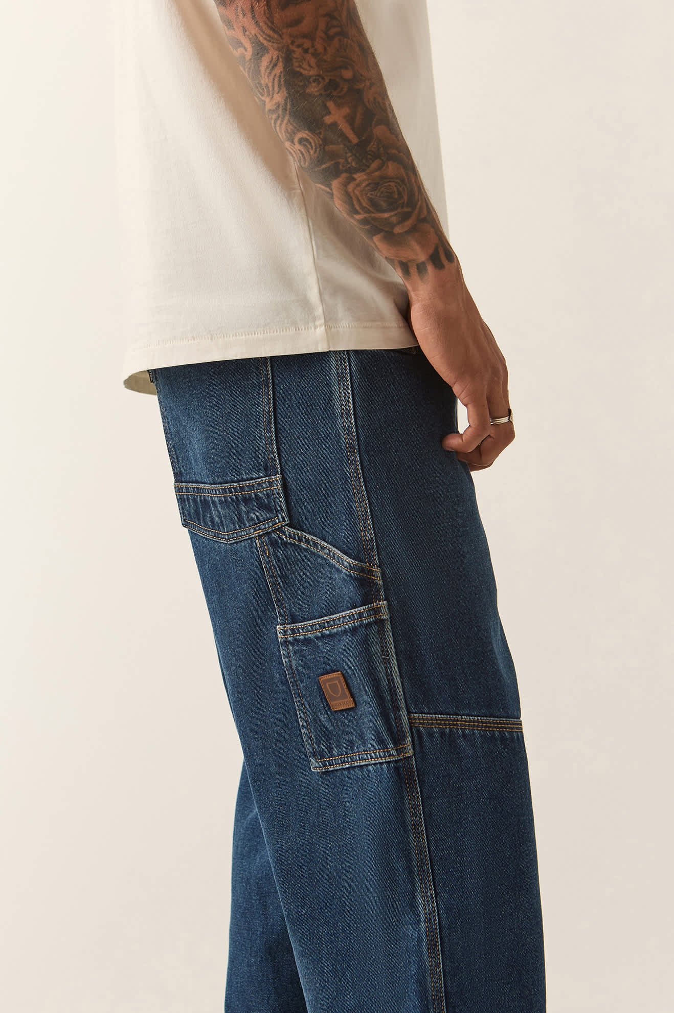 Men's Builders Carpenter Pant in the color Dark Denim - Men's Side View