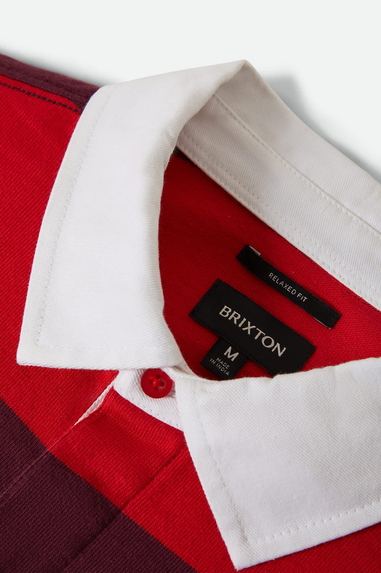 Men's Union Heavyweight Rugby Polo in the color Adrenaline Rush/Port - Additional Laydown image