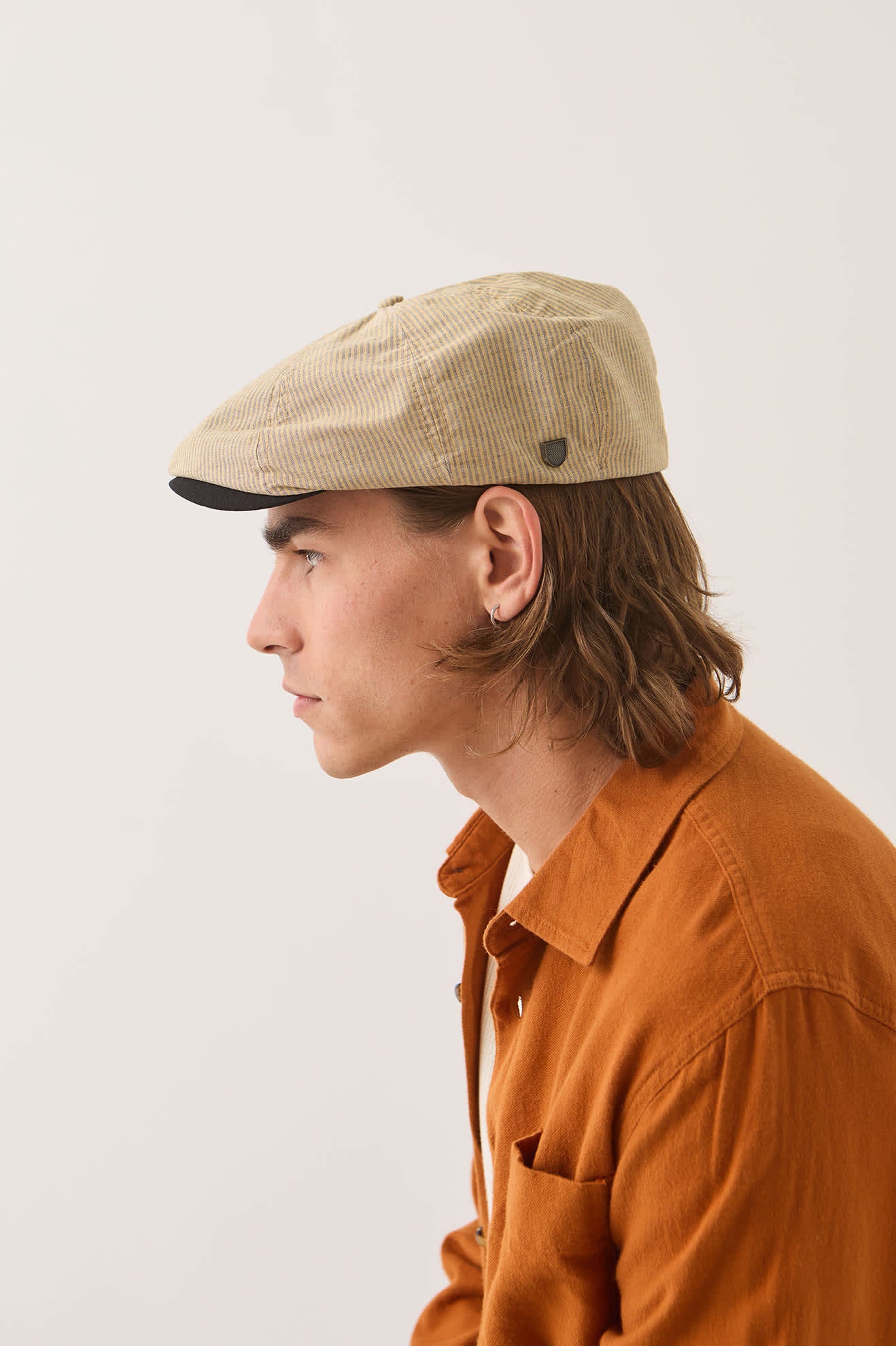 Unisex Hooligan Flat Cap in the color Khaki Stripe/Washed Black - Men's Side View