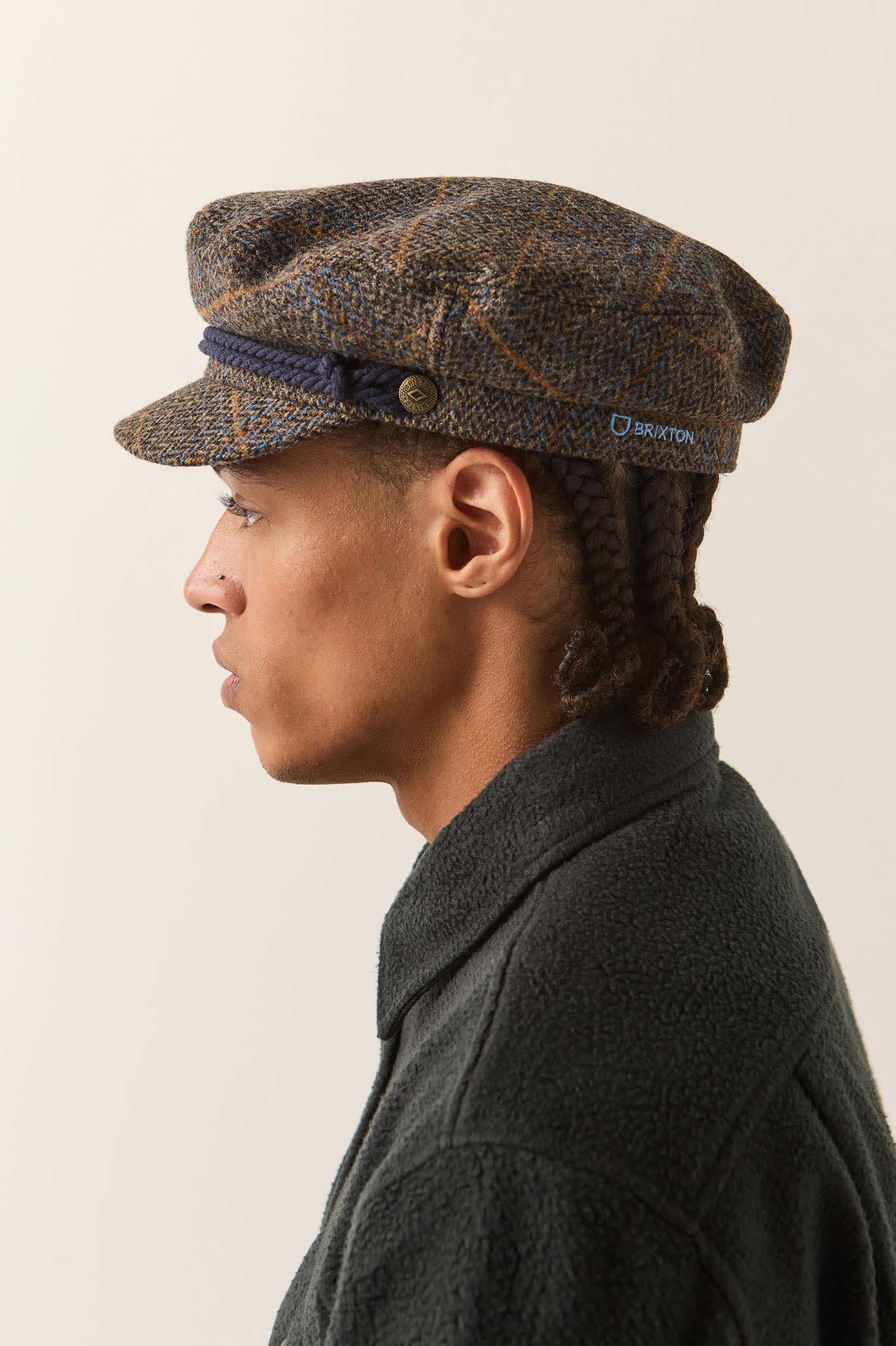 Unisex Fiddler Fisherman Cap in the color Slate Blue/Sepia/Orange - Men's Back View