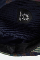 Unisex Brood Newsboy Cap in the color Navy/Green/Red/Cream - Additional Laydown image