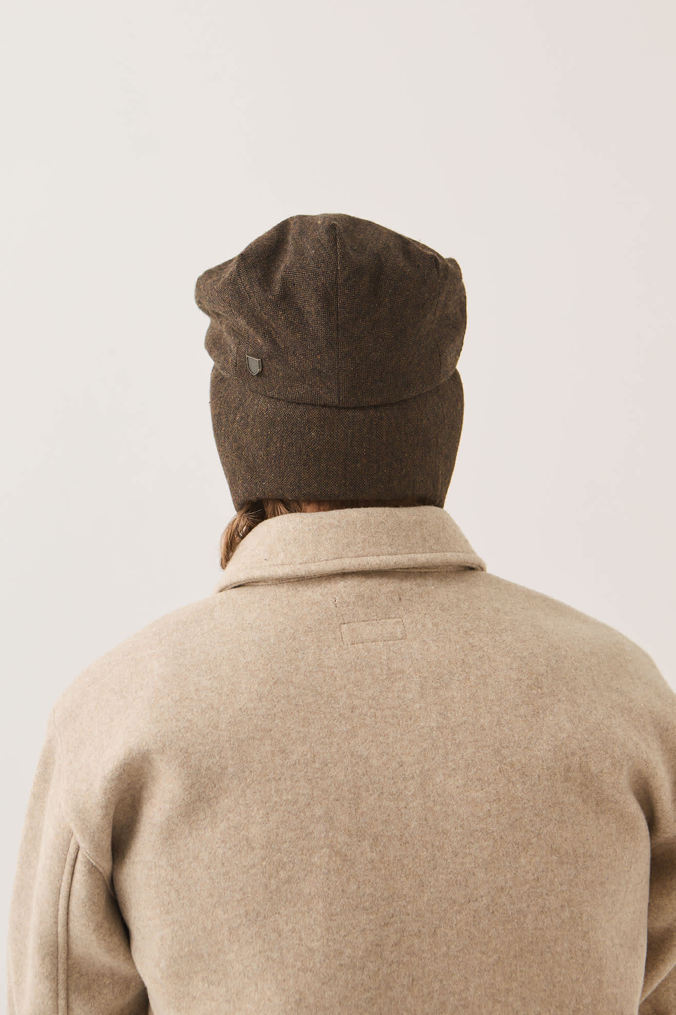Unisex Barrel Earflap Snap Cap in the color Brown/Brown Tweed - Men's Back View