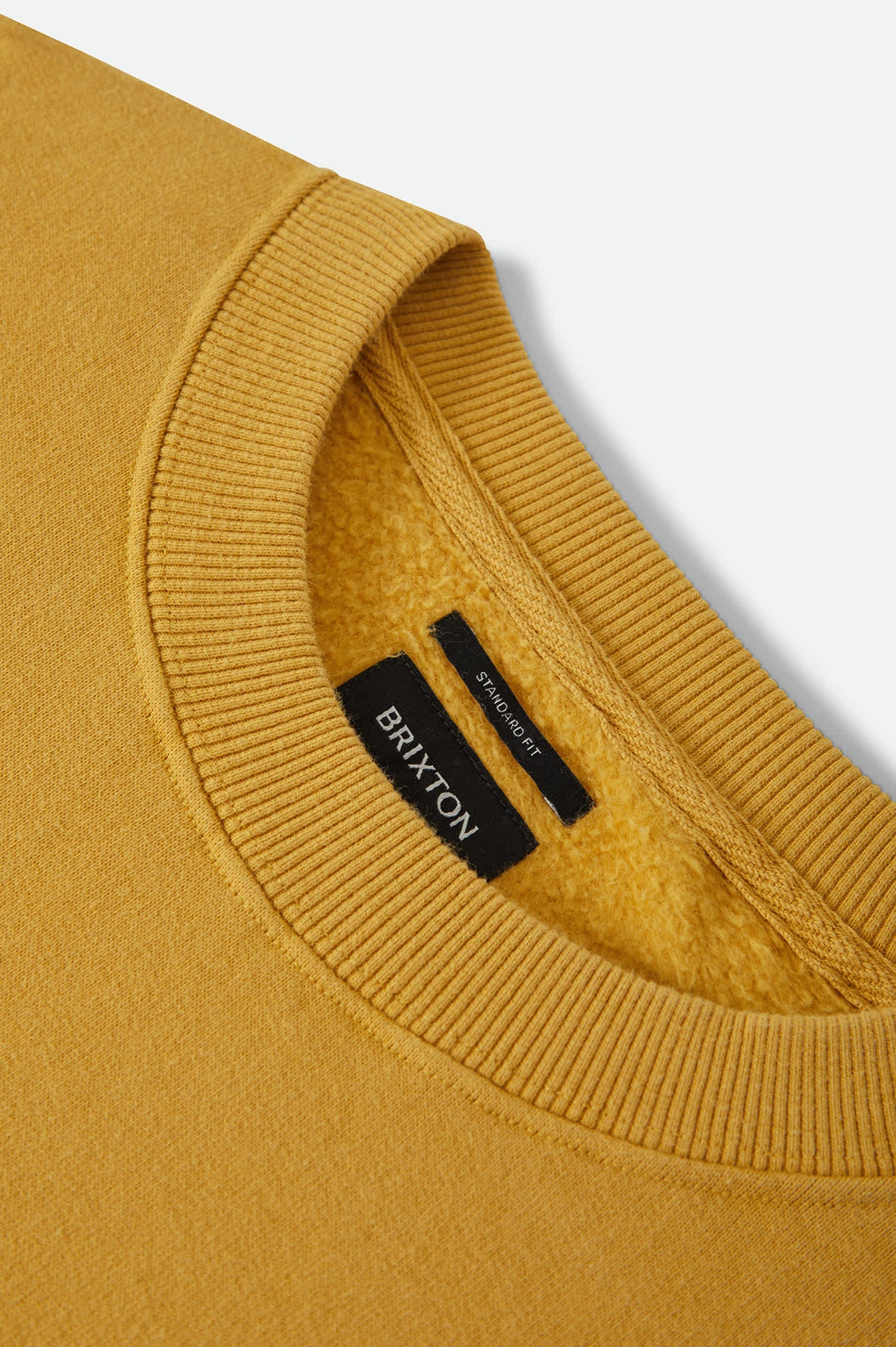 Men's Brixton Baseline Crew Fleece in the color Dusted Ochre Vintage Wash - Additional Laydown image