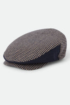 Unisex Hooligan Flat Cap in the color Navy/Sand Houndstooth - Front Product View