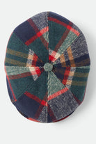 Unisex Brood Newsboy Cap in the color Navy/Green/Red/Cream - Additional Laydown image
