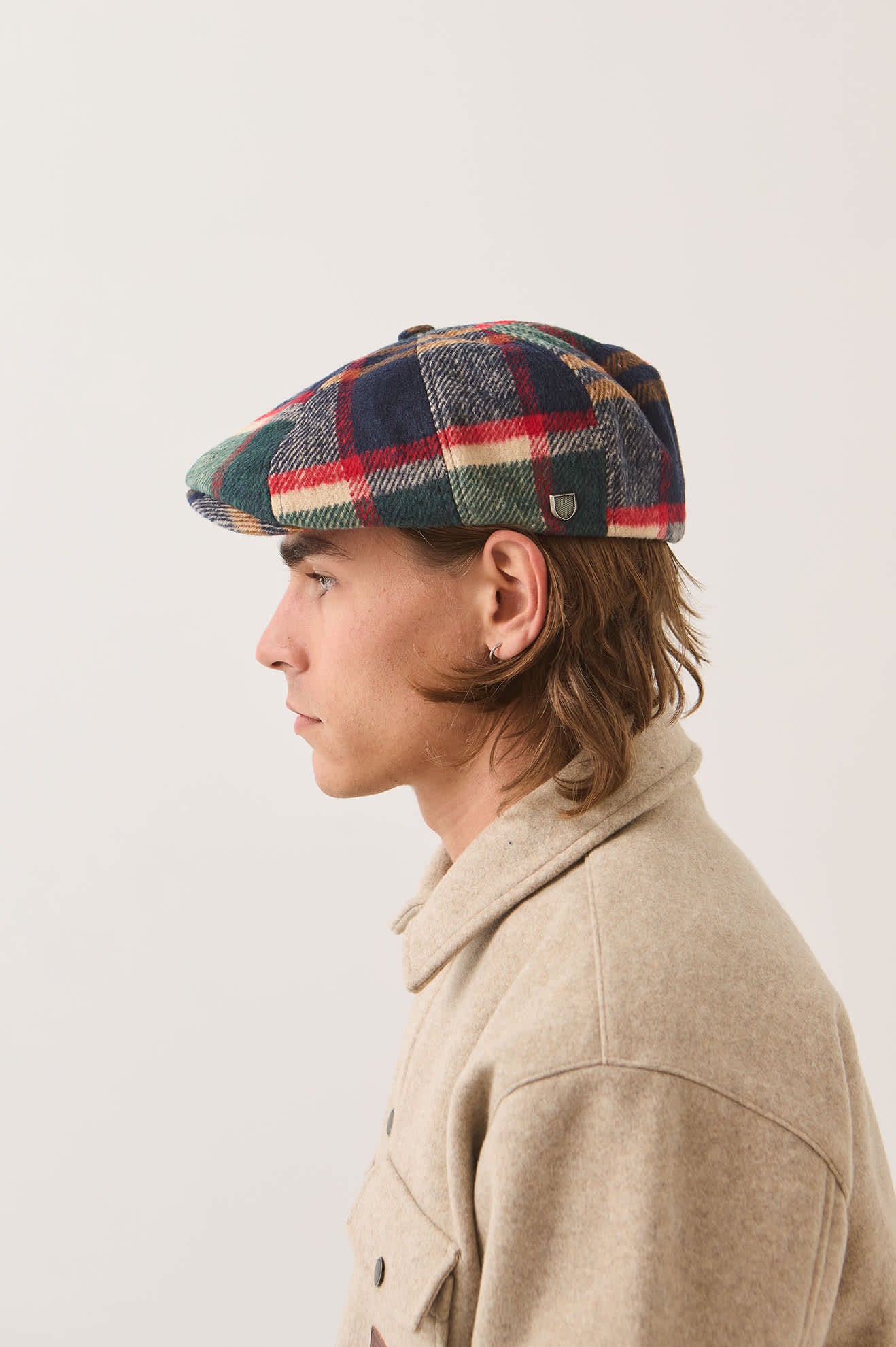 Unisex Brood Newsboy Cap in the color Navy/Green/Red/Cream - Men's Side View