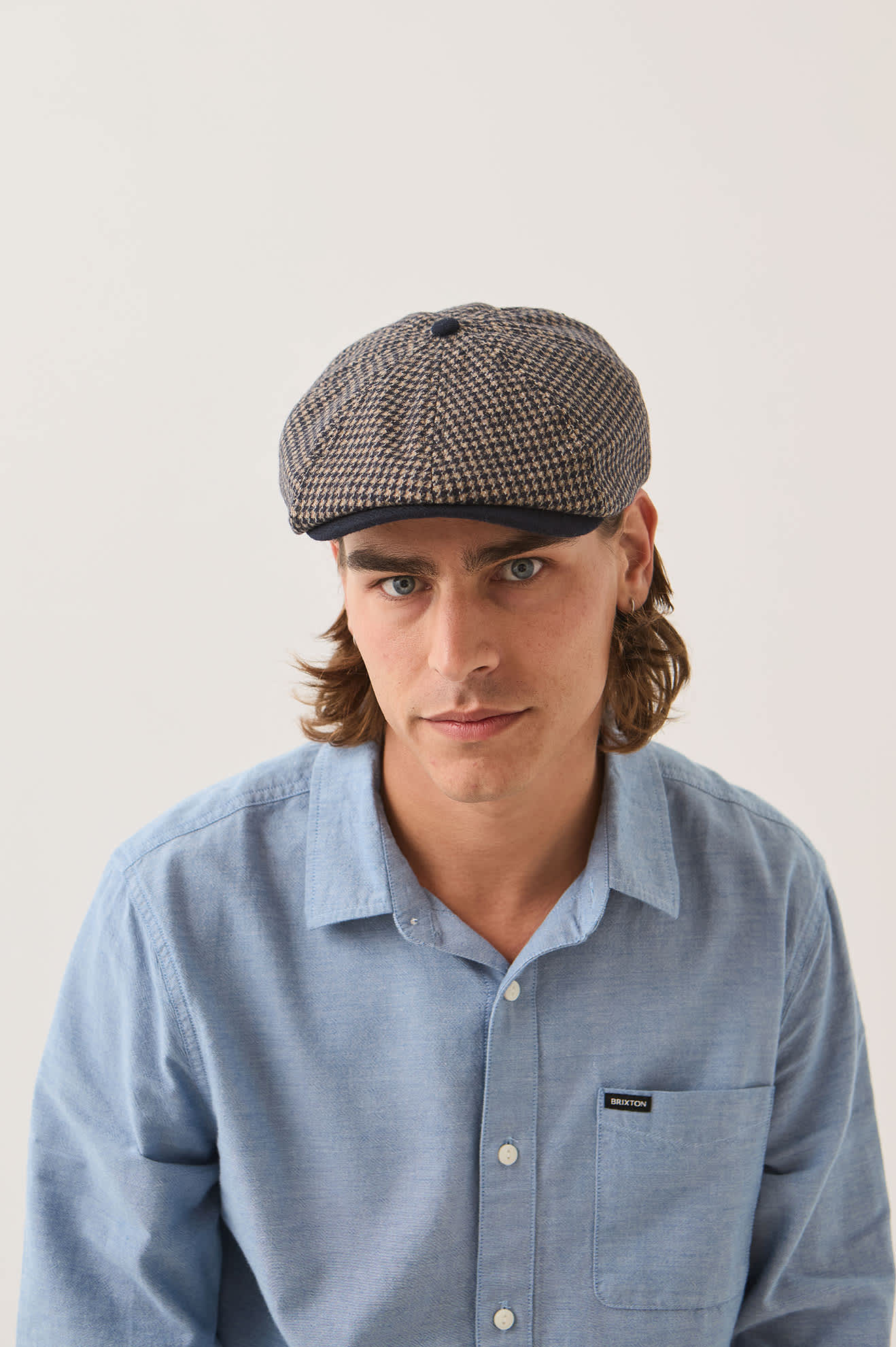 Unisex Brood Newsboy Cap in the color Navy/Sand Houndstooth - Men's Front View