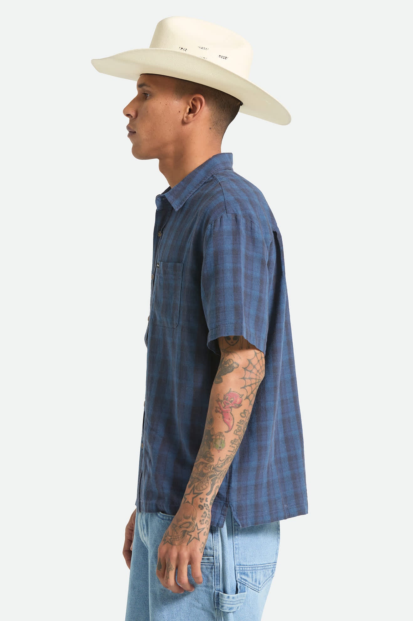 Men's Cru Linen Blend Plaid Short Sleeve Shirt in the color Dark Blue/Black Plaid - Men's Side View