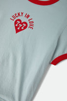 Women's Lucky In Love Baby T-Shirt in the color Sea Grass/Adrenaline Red - Additional Laydown image